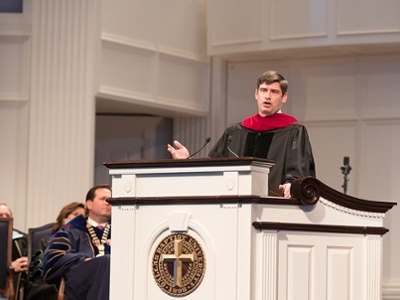 William Franklin Graham IV addresses the audience from the chapel podium