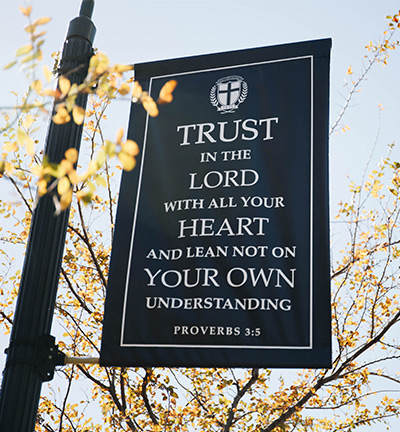 Proverbs 3:5 Verse Sign on Campus - Dallas